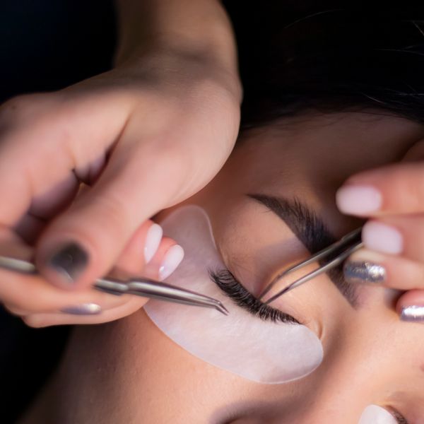 Lash extensions being applied lash by lash